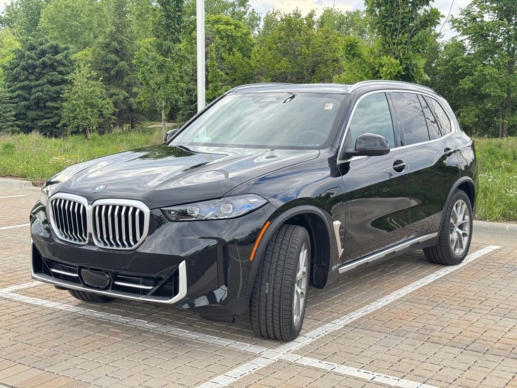Used 2026 Black Sapphire Metallic BMW xDrive50e image 3