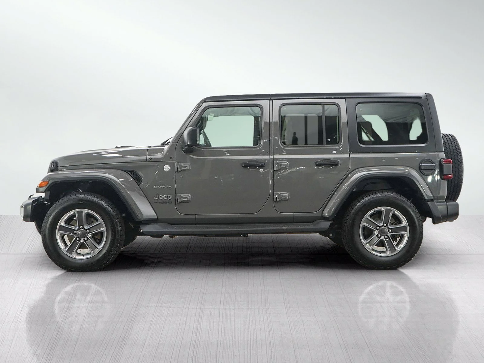 Used 2021 Jeep Wrangler Unlimited Sahara with VIN 1C4HJXEN9MW516681 for sale in Hopkins, Minnesota