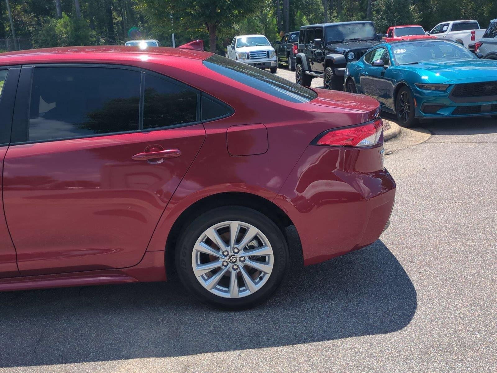 Used 2024 Ruby Flare Pearl Toyota Hybrid LE image 11