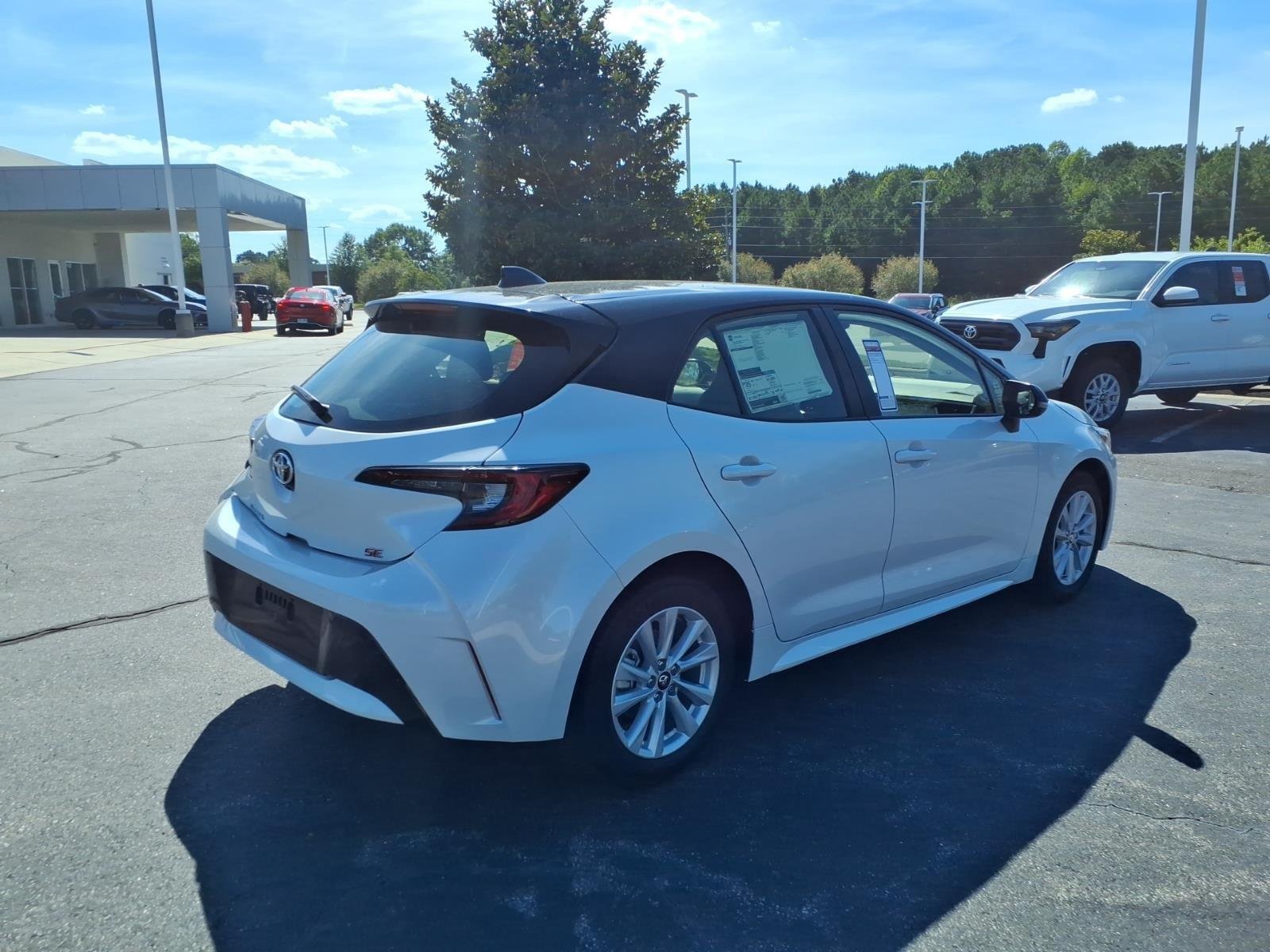 New 2027 Wind Chill Pearl with Black roof Toyota SE image 2