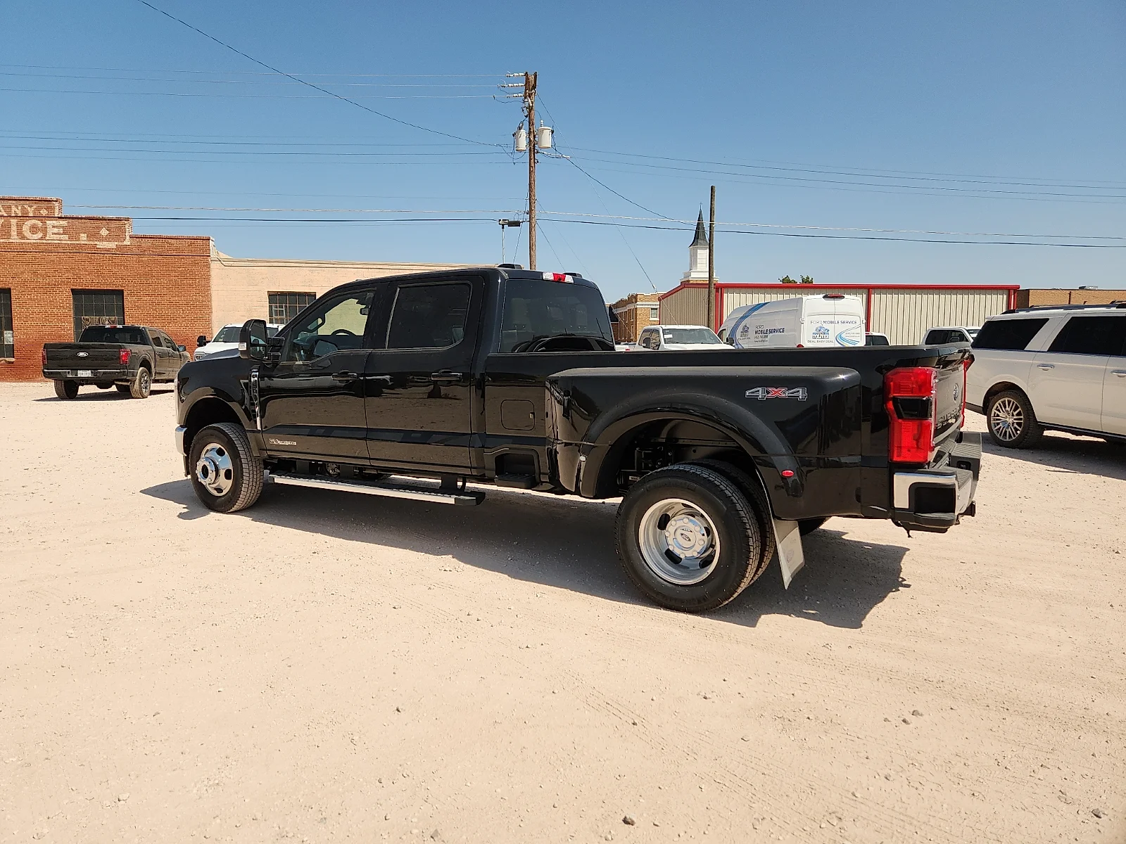 New 2026 Black Metallic Ford Lariat image 4