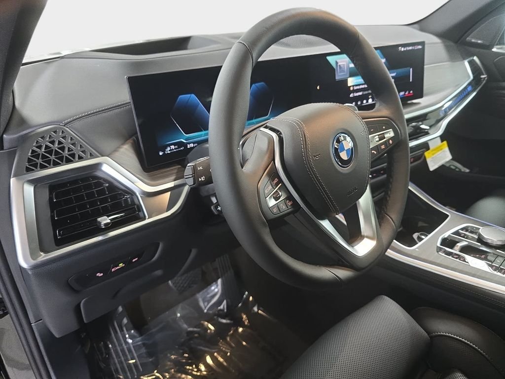 New 2026 Black Sapphire Metallic BMW xDrive50e image 17