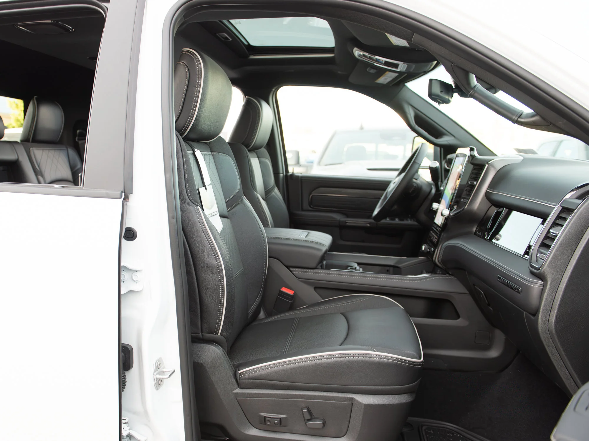 New 2027 White RAM Limited Night* Mega Cab 4x4, Tow-Tech Plus Group, Sunroof, Passenger Screen image 33