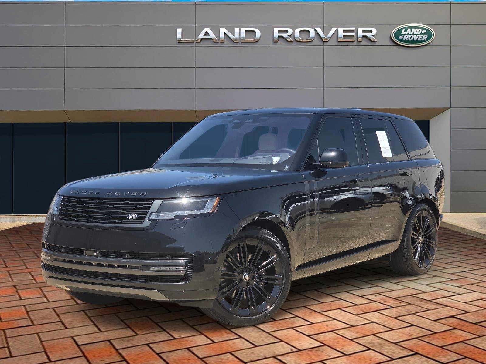 Used 2023 Santorini Black Metallic Land Rover SE image 1