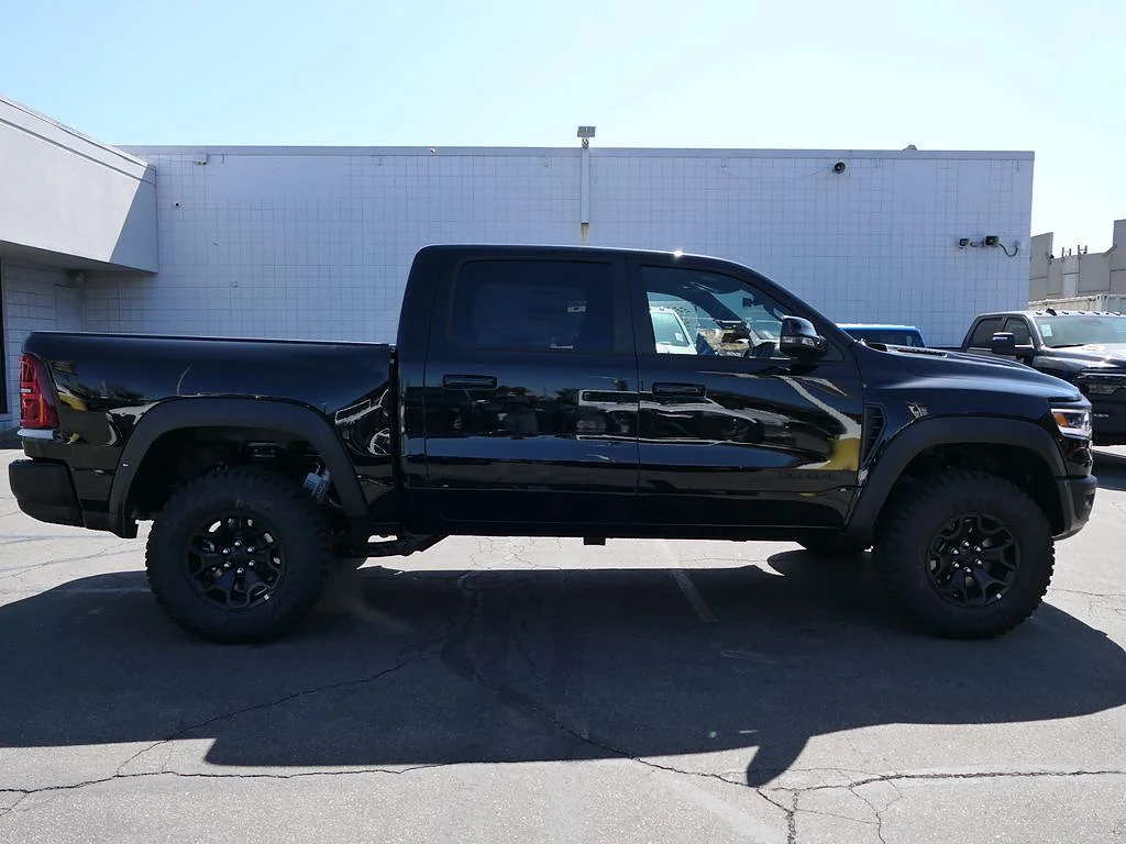 New 2026 Diamond Black Crystal Pearl Coat RAM RHO Crew Cab 4x4 5