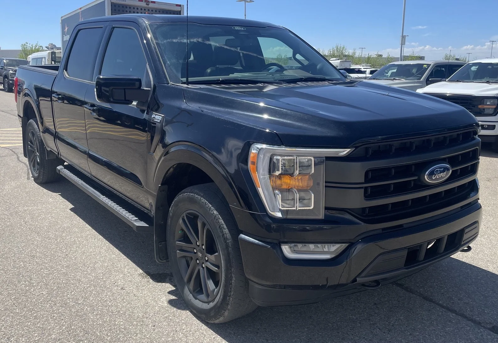 Used 2022 Black Ford LARIAT SuperCrew image 7