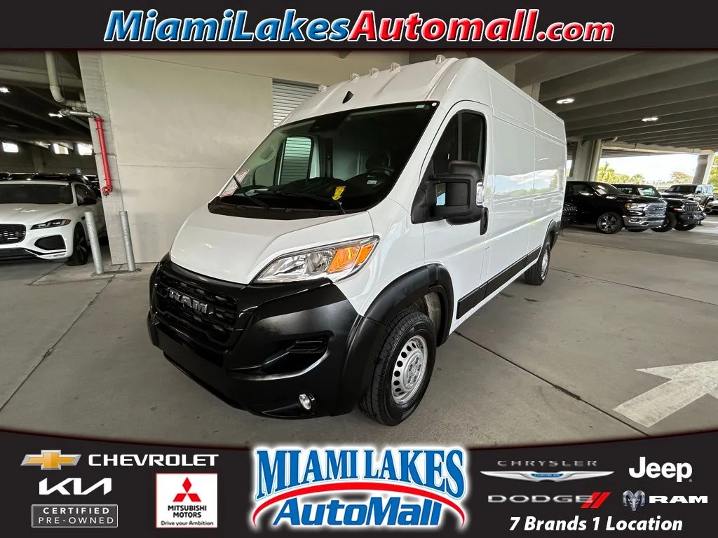 Used 2025 Bright White Clearcoat Ram High Roof image 1