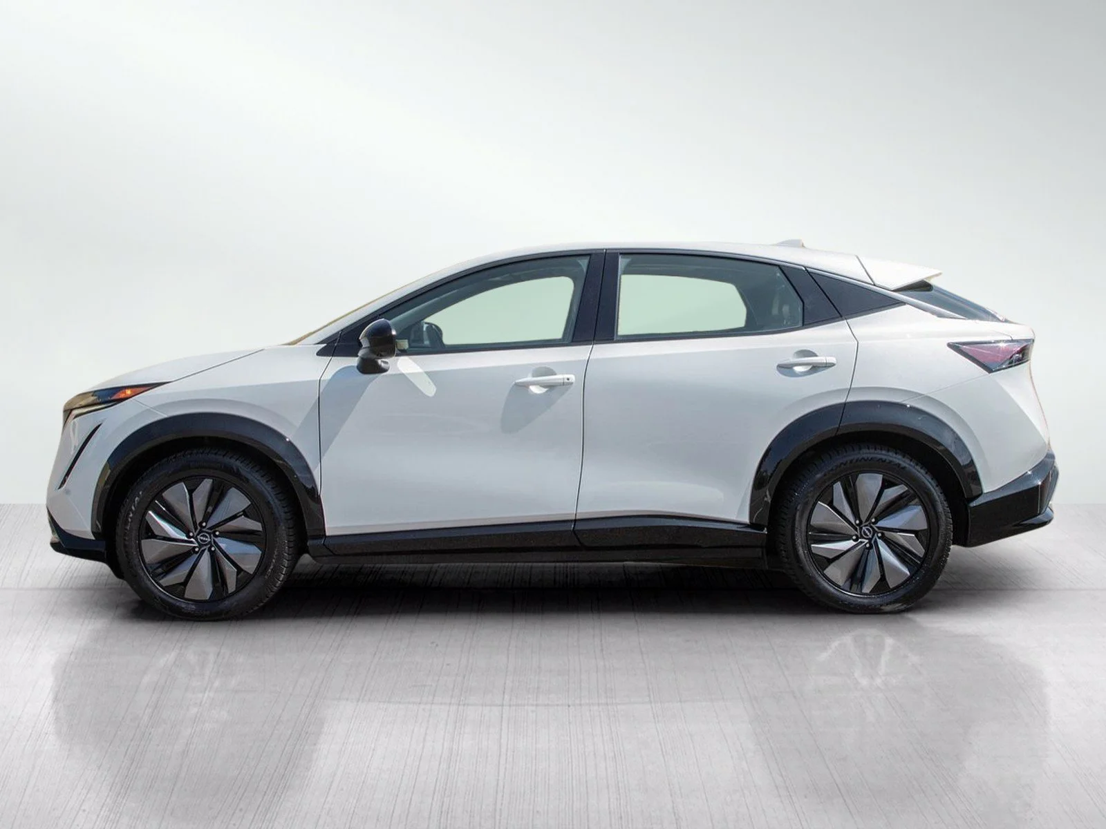 Used 2024 Everest White Pearl Tricoat Nissan EVOLVE+ e-4ORCE image 2