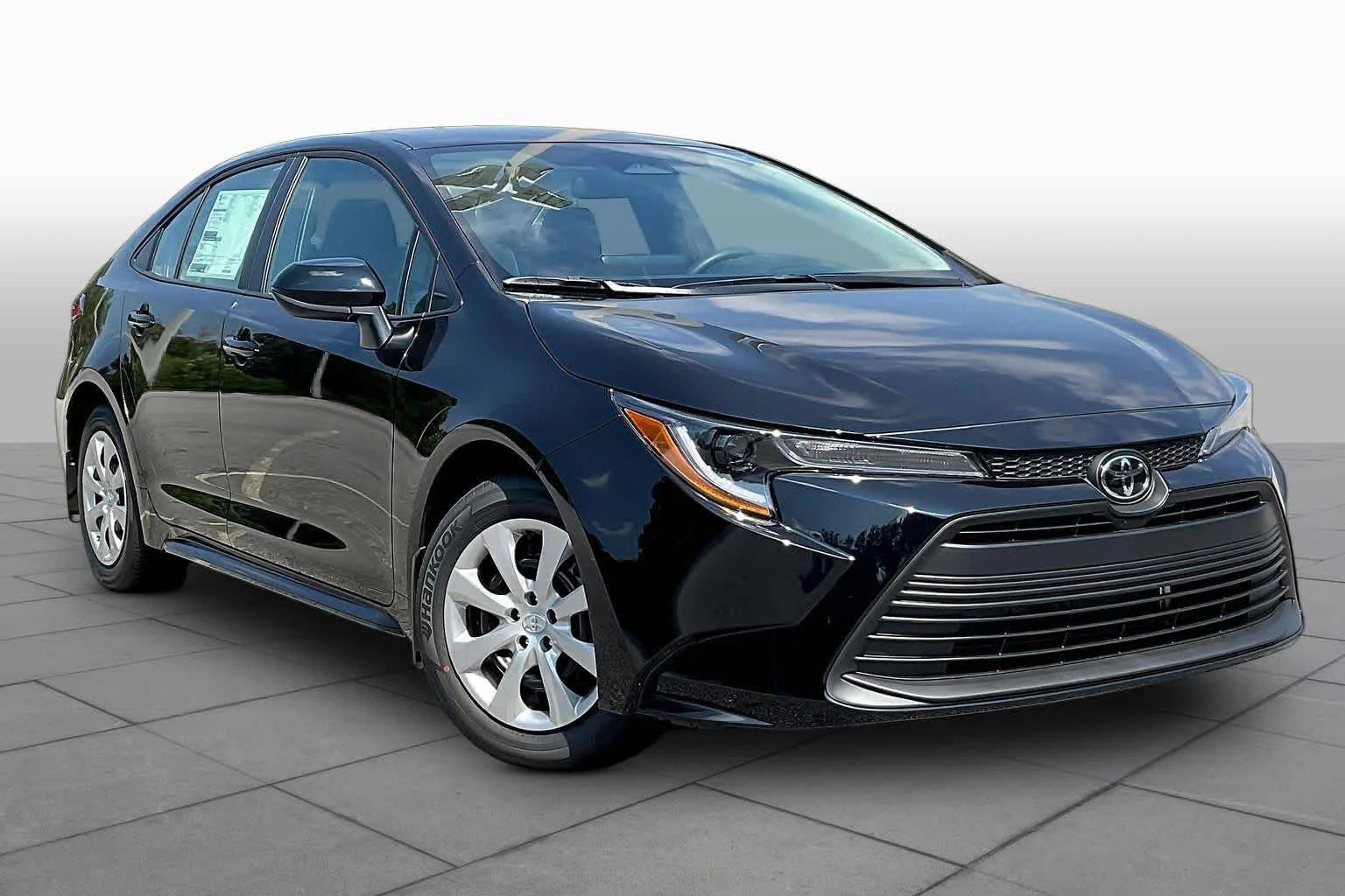 New 2026 Midnight Black Metallic Toyota LE image 2
