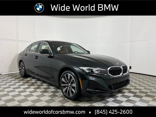Used 2026 Black Sapphire Metallic BMW 330i xDrive image 1