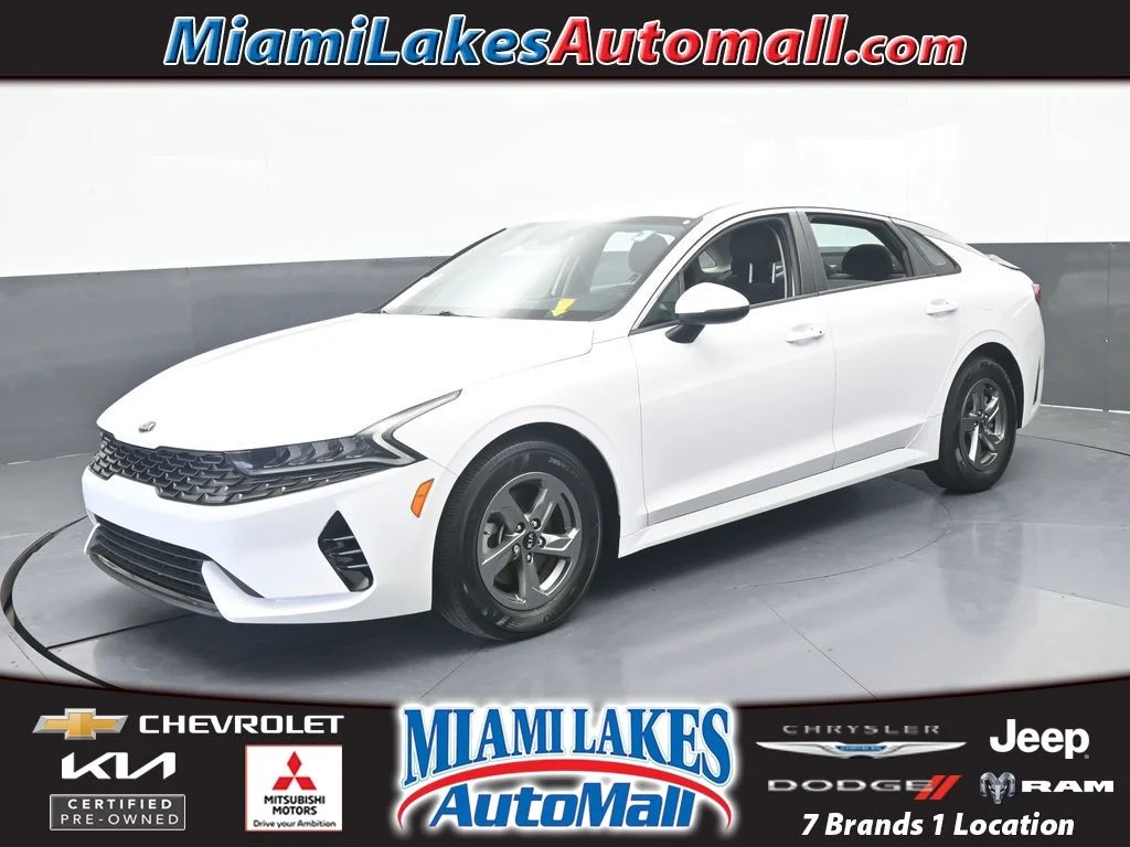 Used 2021 Glacial White Pearl Kia LXS image 1