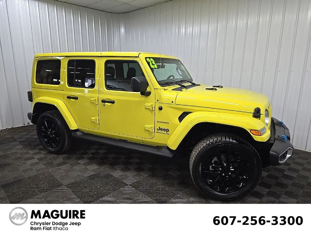 Used 2023 Yellow Jeep Sahara 4xe image 1