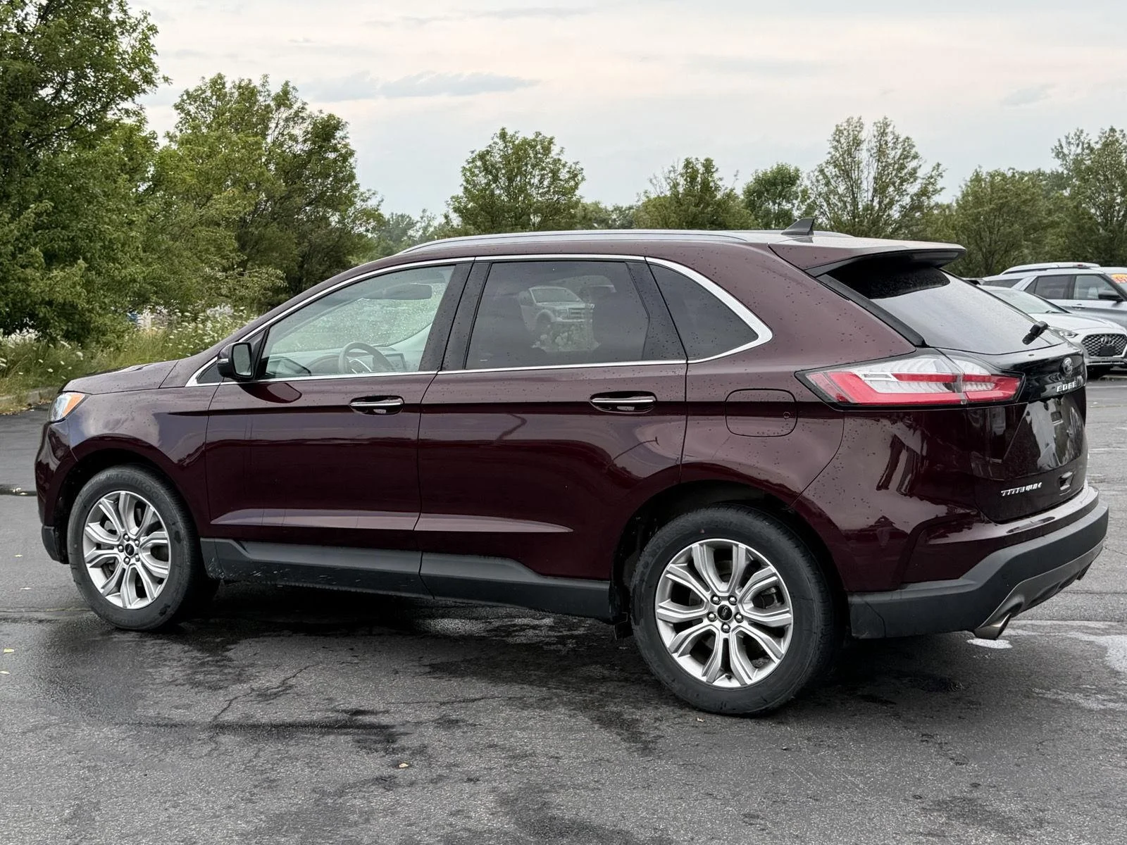 Used 2024 Burgundy Velvet Metallic Tinted Clearcoat Ford Titanium image 5