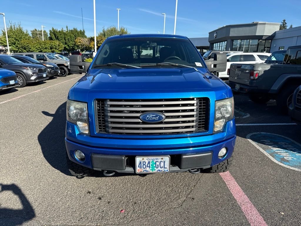 Used 2011 Blue Flame Metallic Ford FX4 image 1
