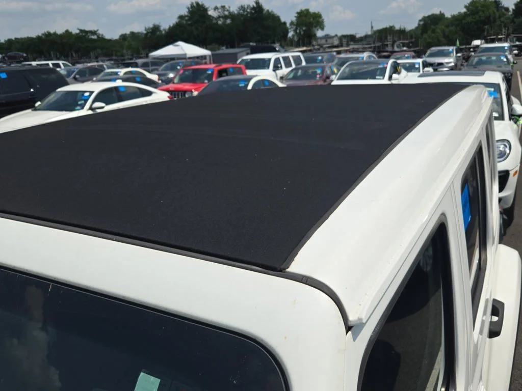 Used 2019 White Jeep Unlimited Sahara image 6