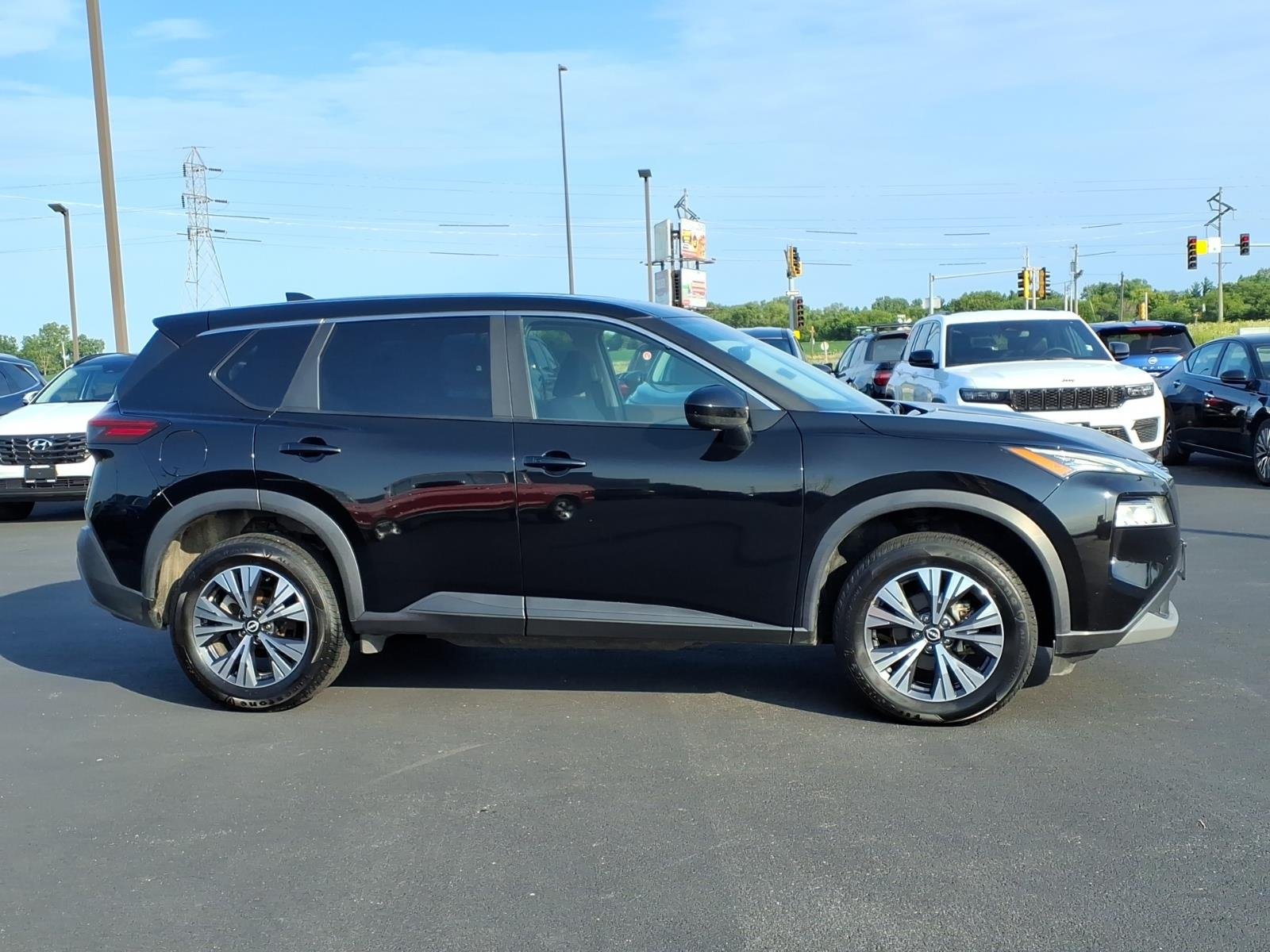 Used 2023 Super Black Nissan SV image 2