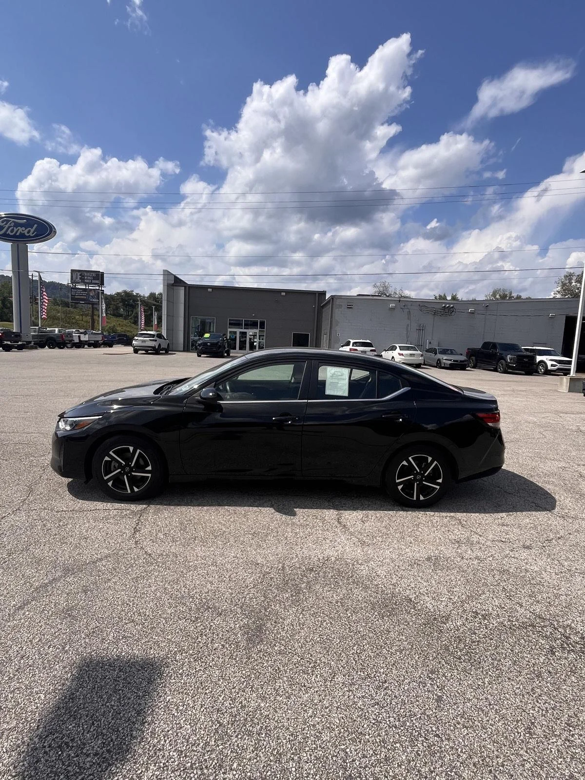 Used 2024 Super Black Nissan SV image 5