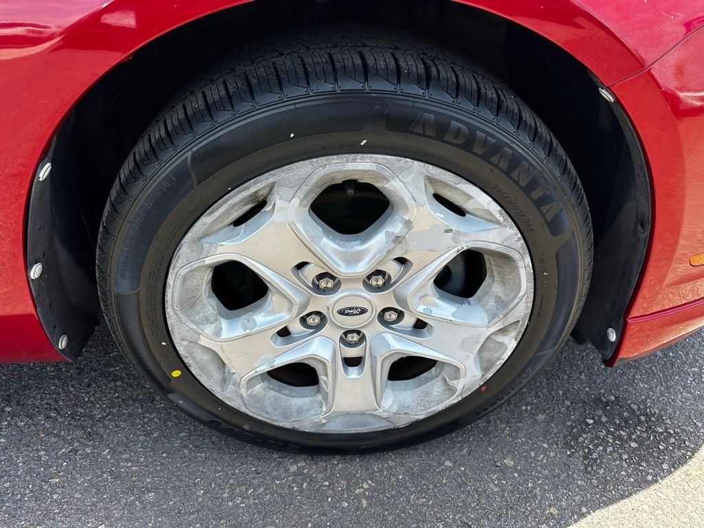 Used 2010 Red Candy Metallic Tinted Clearcoat Ford SE image 11
