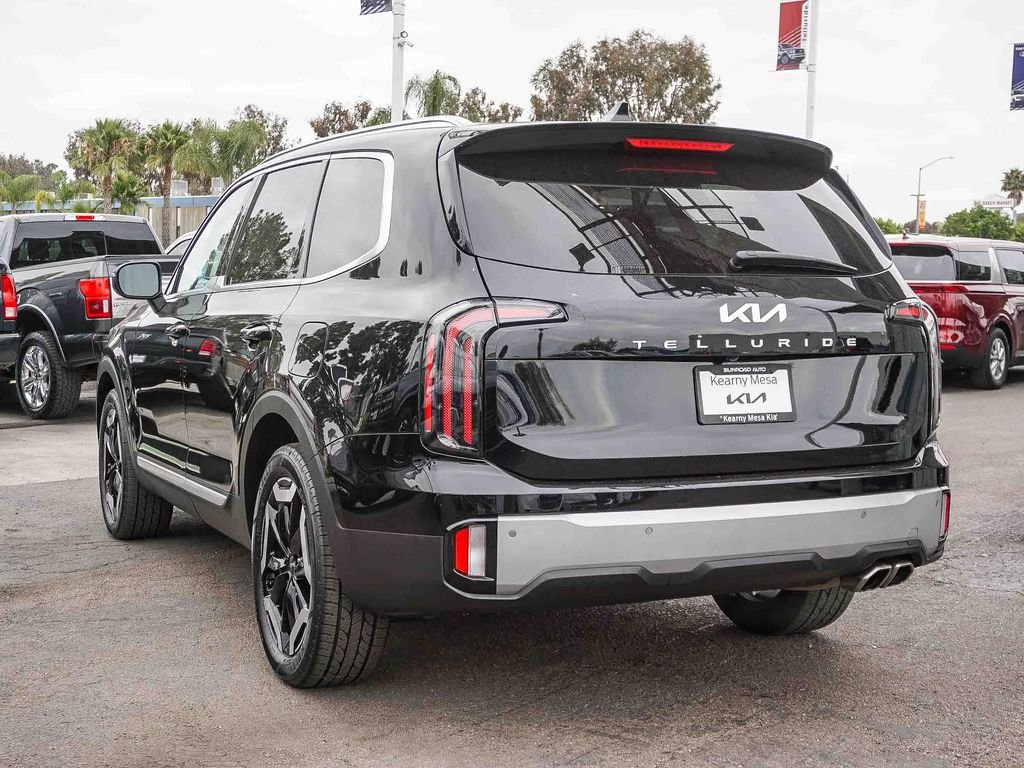 Used 2024 Ebony Black Kia EX image 5