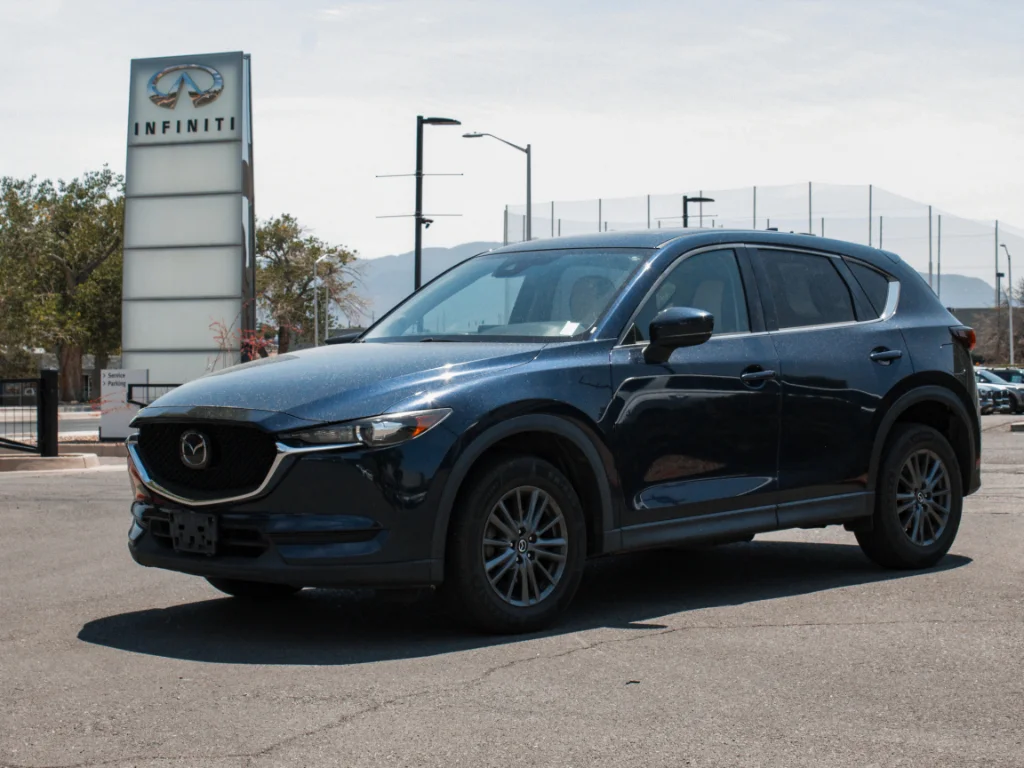 Used 2019 Deep Crystal Blue Mica Mazda Touring image 1