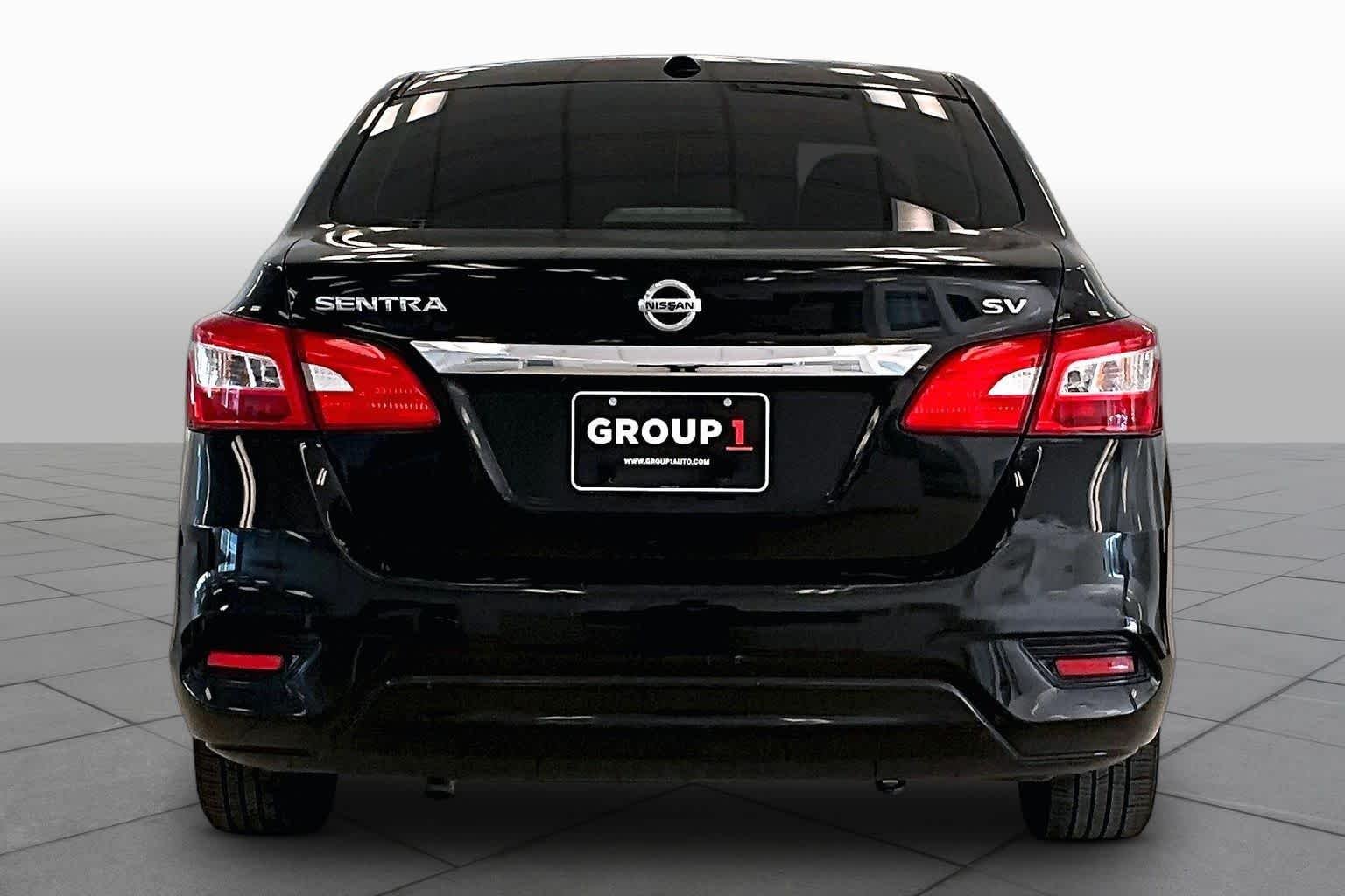 Used 2017 Super Black Nissan SV image 4