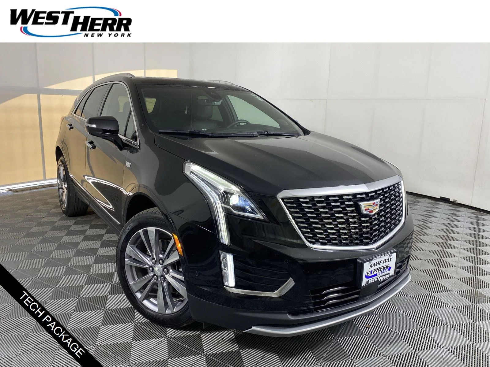 Used 2025 Stellar Black Metallic Cadillac AWD Premium Luxury image 1