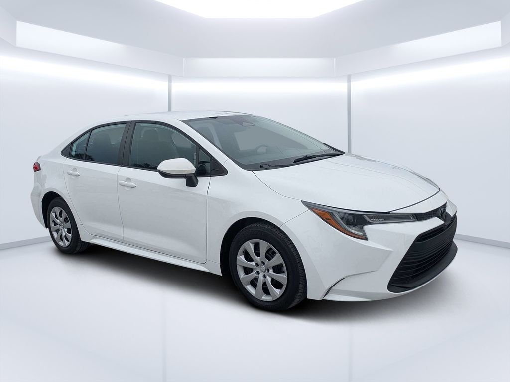 Used 2023 White Toyota LE image 1