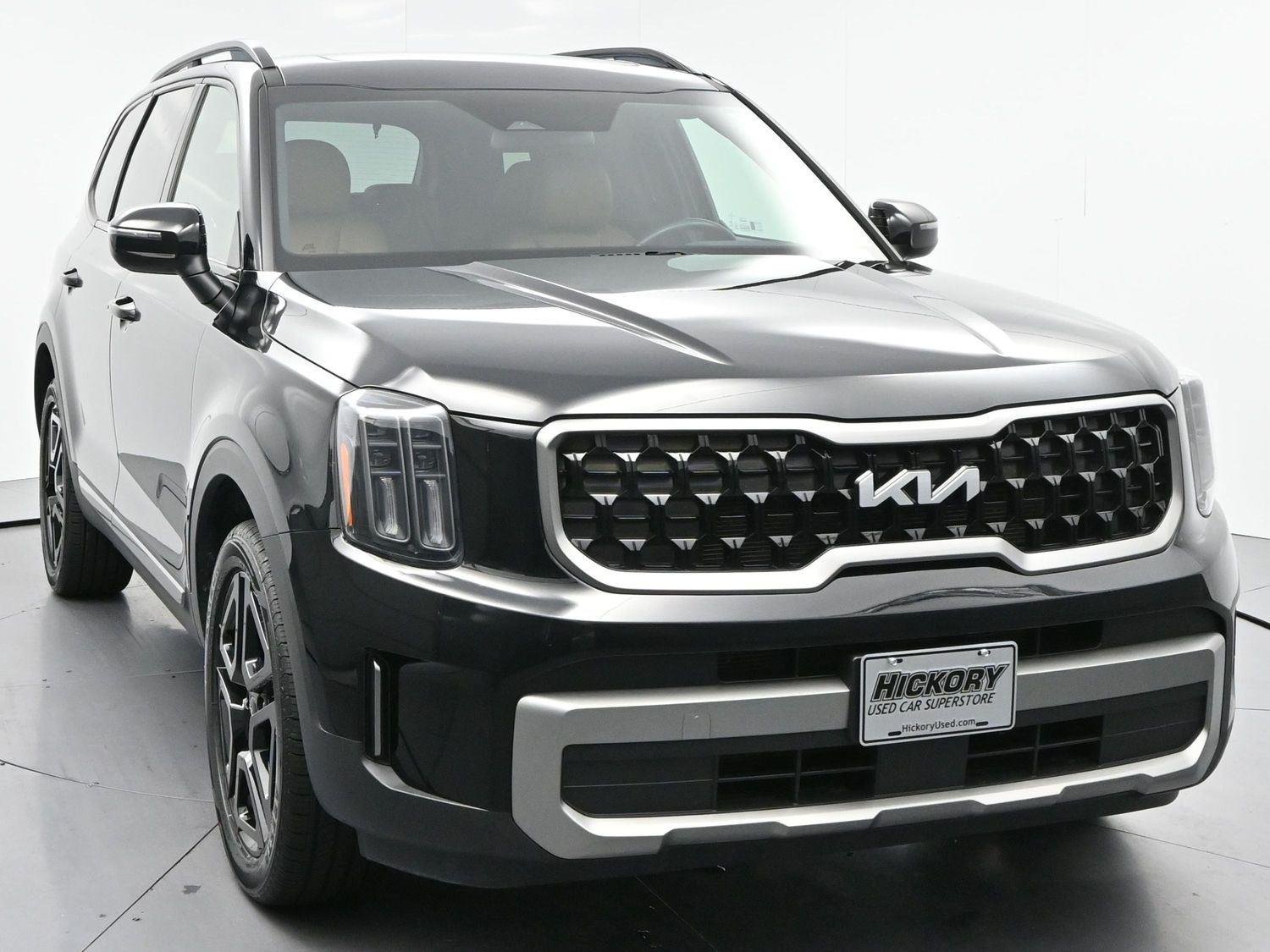 Used 2023 Ebony Black Kia EX X-Line image 2