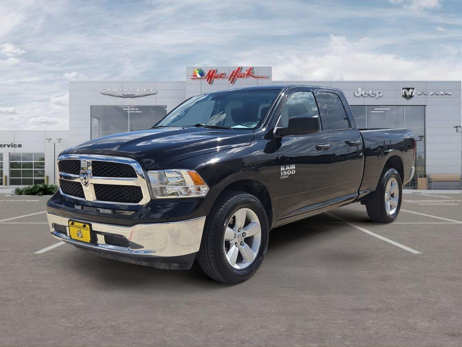 Used 2024 Diamond Black Crystal Pearlcoat Ram SLT image 1