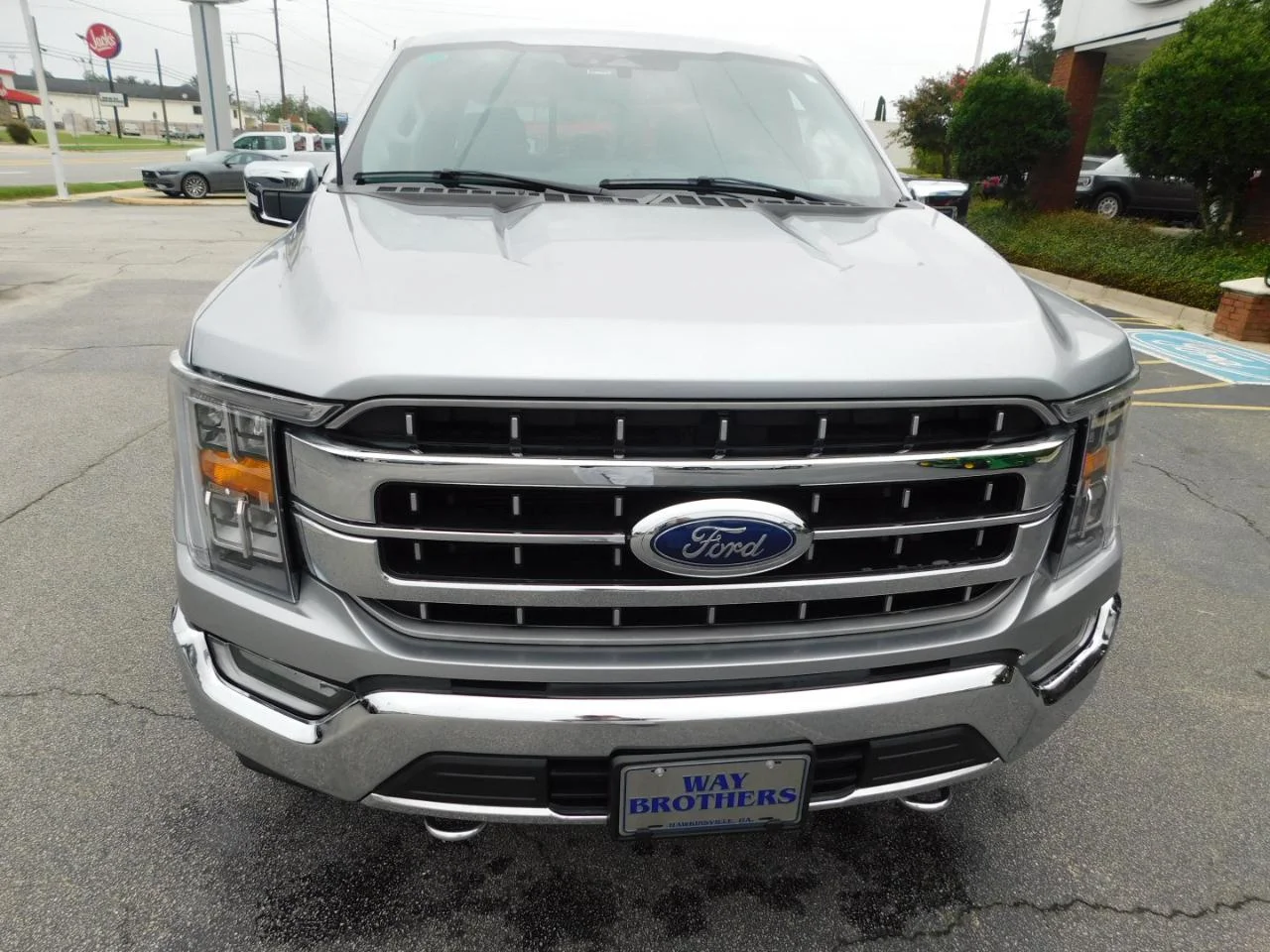Used 2023 Iconic Silver Metallic Ford LARIAT 4WD SUPERCREW 6.5 ft image 3