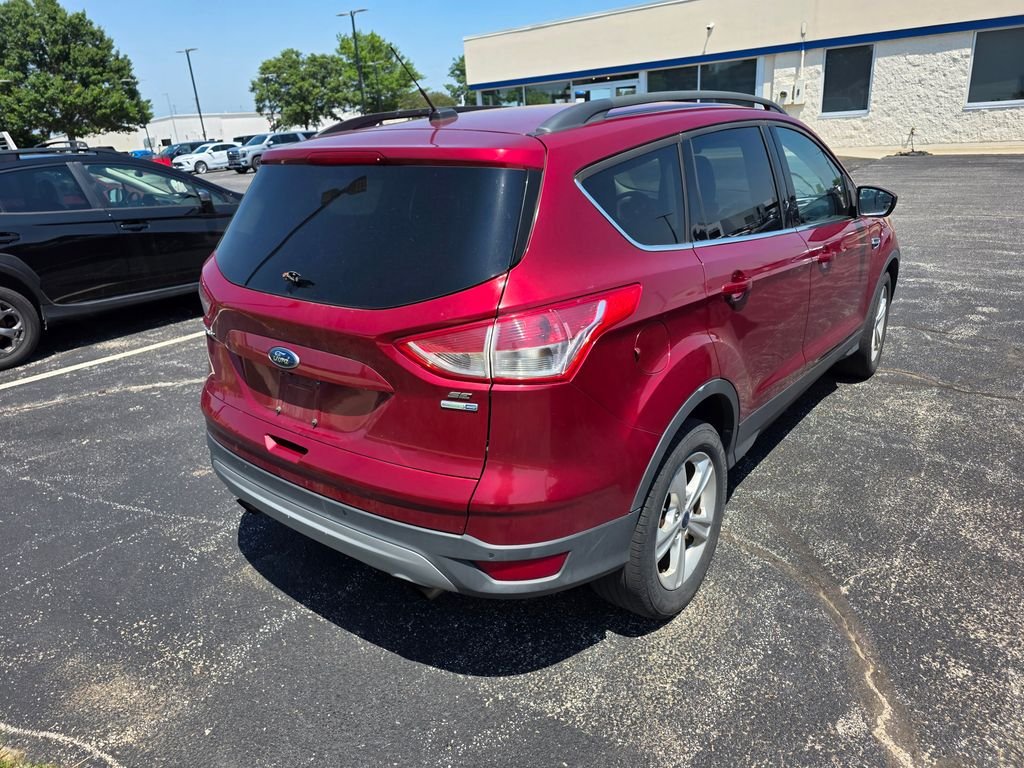 Used 2016 Ruby Red Metallic Ford SE image 4
