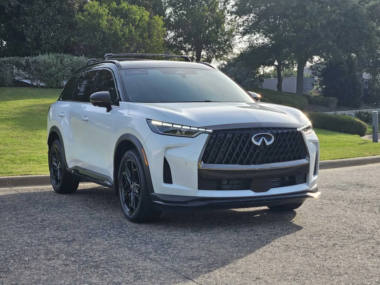 Certified Used 2026 Radiant White/Black Obsidian INFINITI SPORT image 4