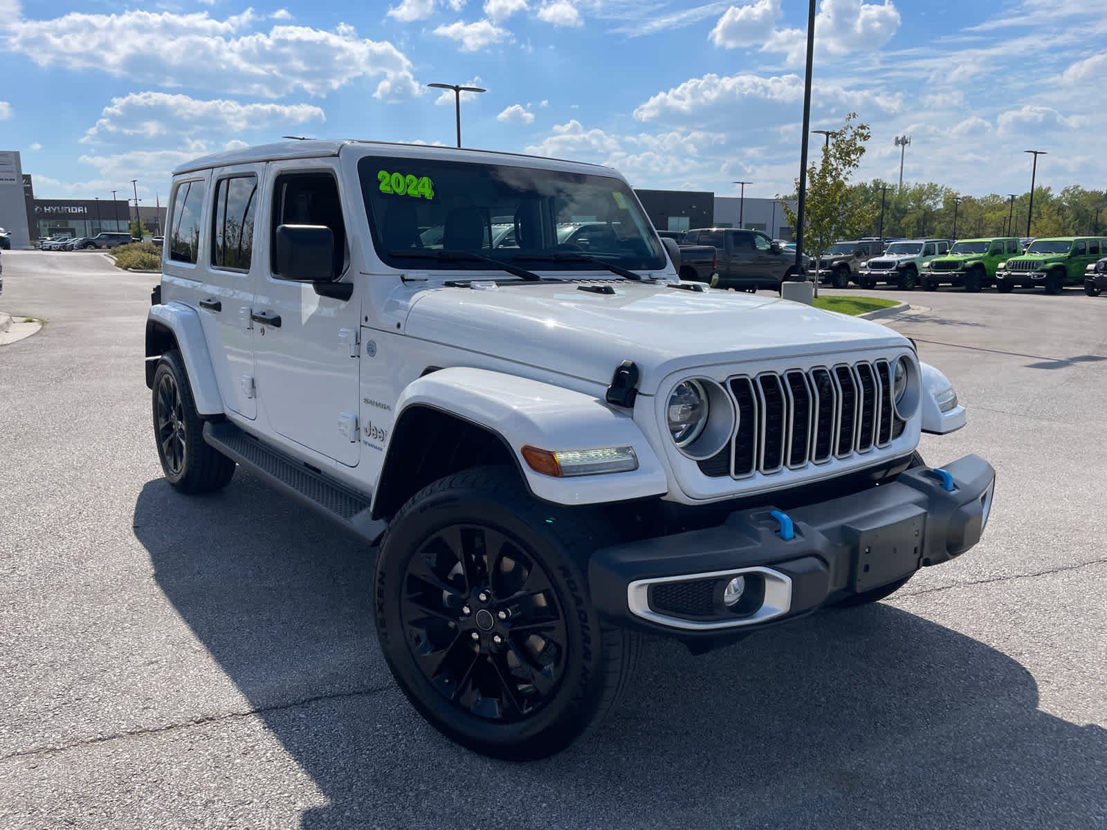 Used 2024 Jeep Wrangler 4xe Sahara 4XE with VIN 1C4RJXP6XRW119143 for sale in Kansas City