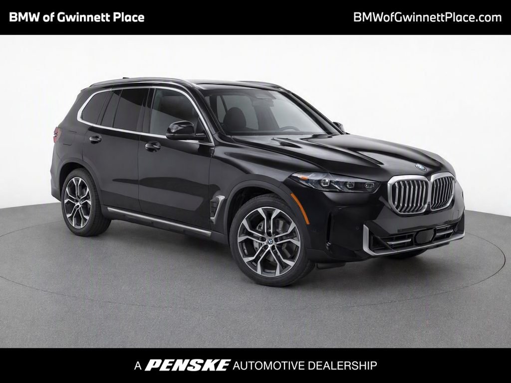 Certified Used 2026 Black Sapphire Metallic BMW sDrive40i image 1