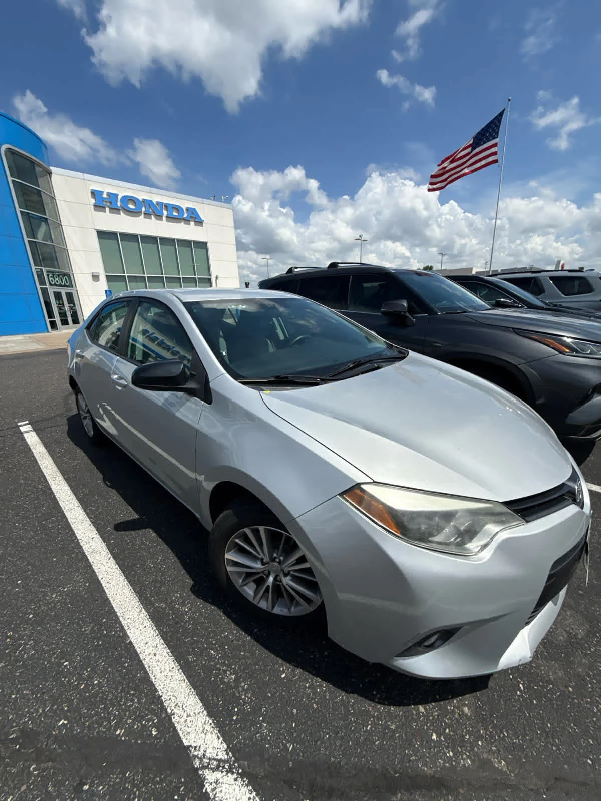 Used 2015 Classic Silver Metallic Toyota LE Plus image 4