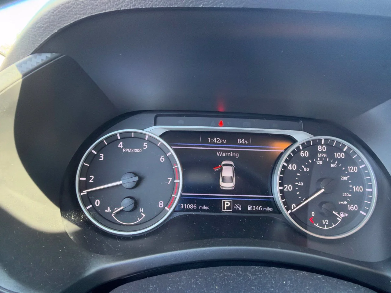 Used 2024 Aspen White Tricoat Nissan SV image 9