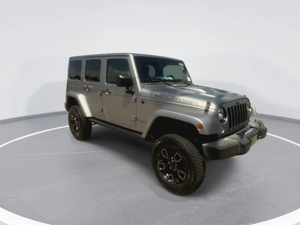 Used 2017 Silver Jeep Unlimited Sahara image 2