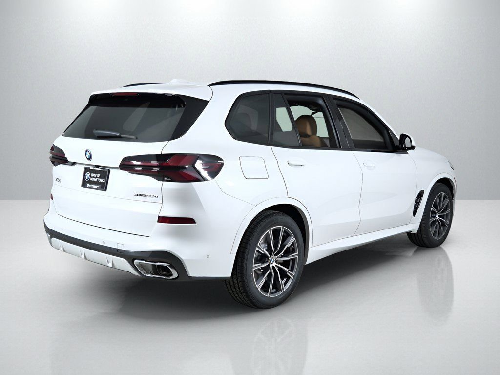 Used 2026 Mineral White Metallic BMW xDrive50e image 10