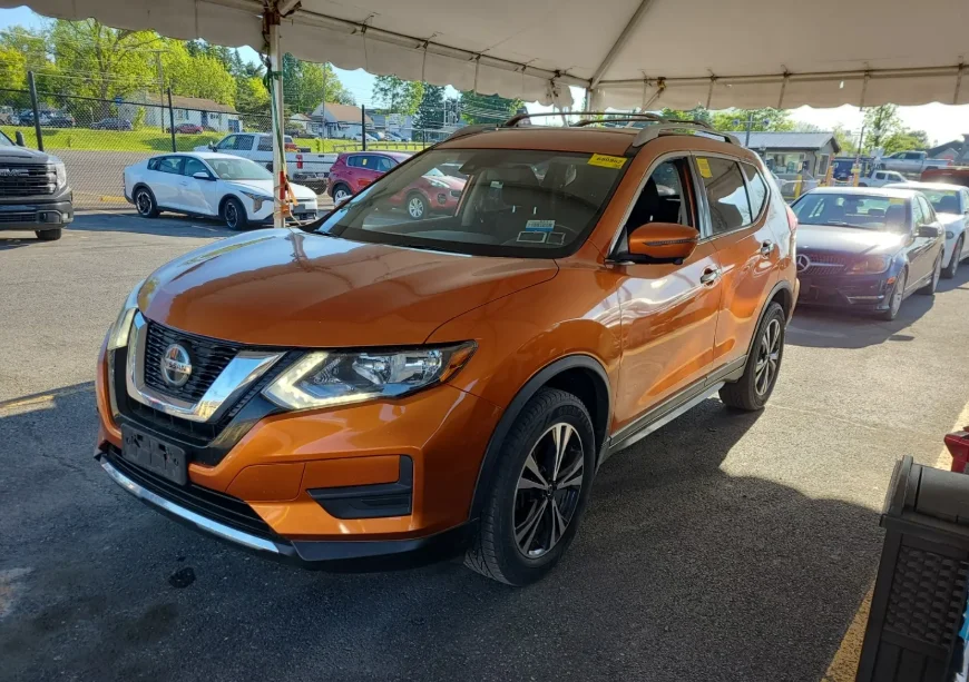 Used 2019 Orange Nissan SV image 2
