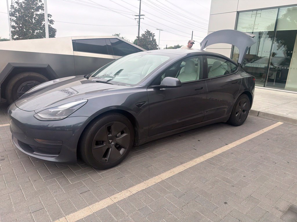 Used 2023 Midnight Silver Metallic Tesla Base image 1