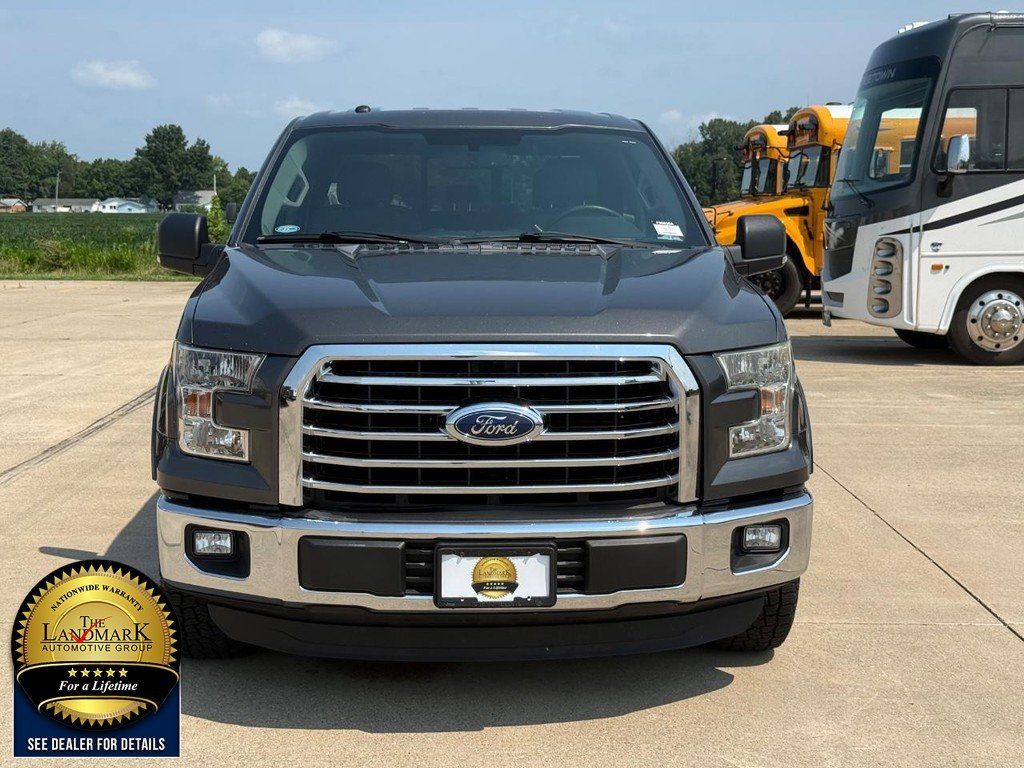Used 2015 Magnetic Metallic Ford 2WD SuperCrew 145" XLT image 2