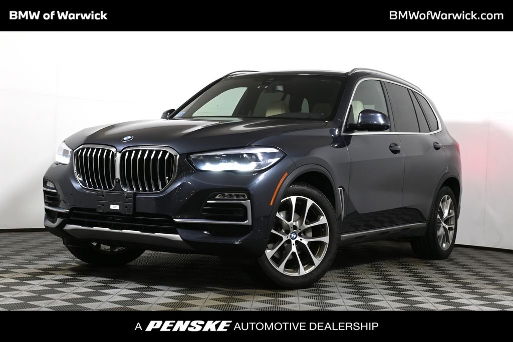 Used 2019 Gray BMW xDrive40i image 1