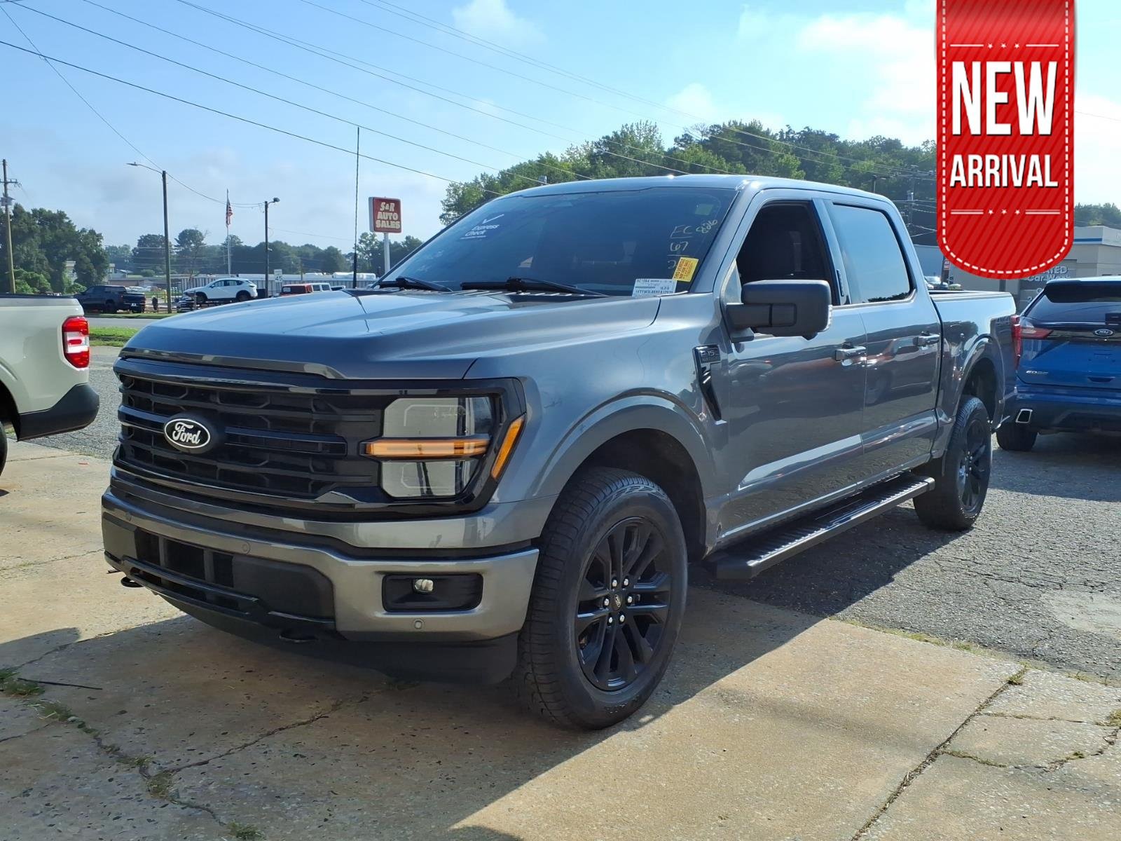 Used 2024 Carbonized Gray Metallic Ford XLT image 1