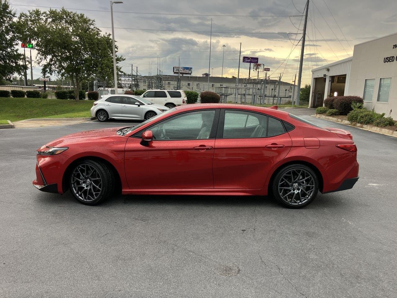 Used 2025 Red (Supersonic Red) Toyota SE image 2