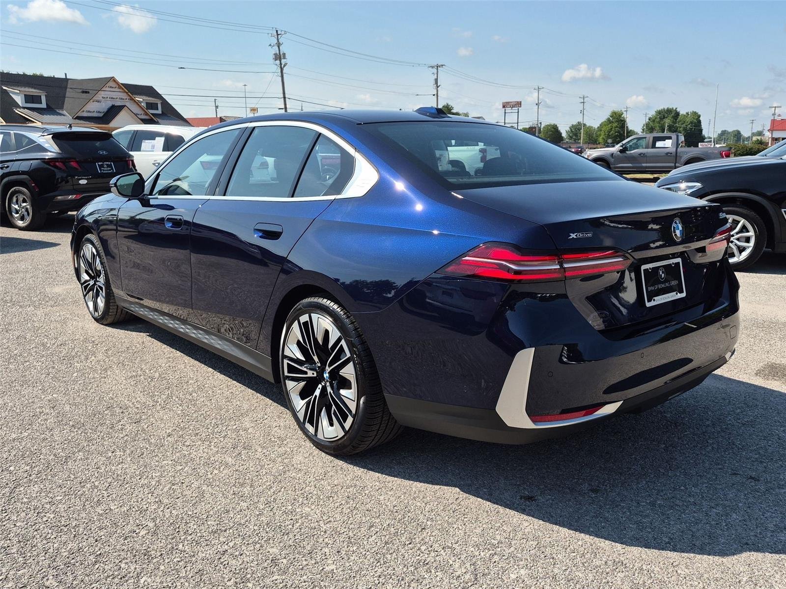 Used 2026 Tanzanite Blue II Metallic BMW 530i xDrive image 3