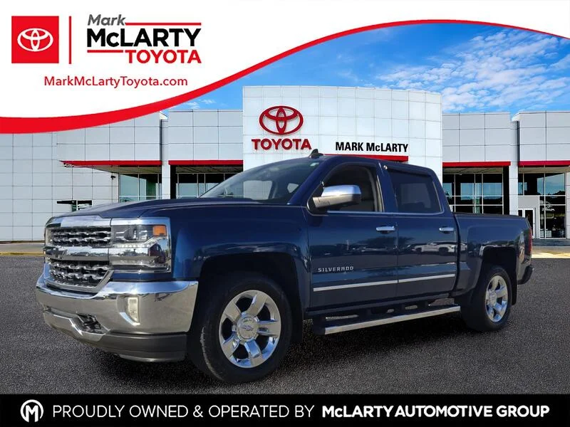 Used 2018 Deep Ocean Blue CHEVROLET 4WD CREW CAB 143.5" LTZ W/1LZ image 1