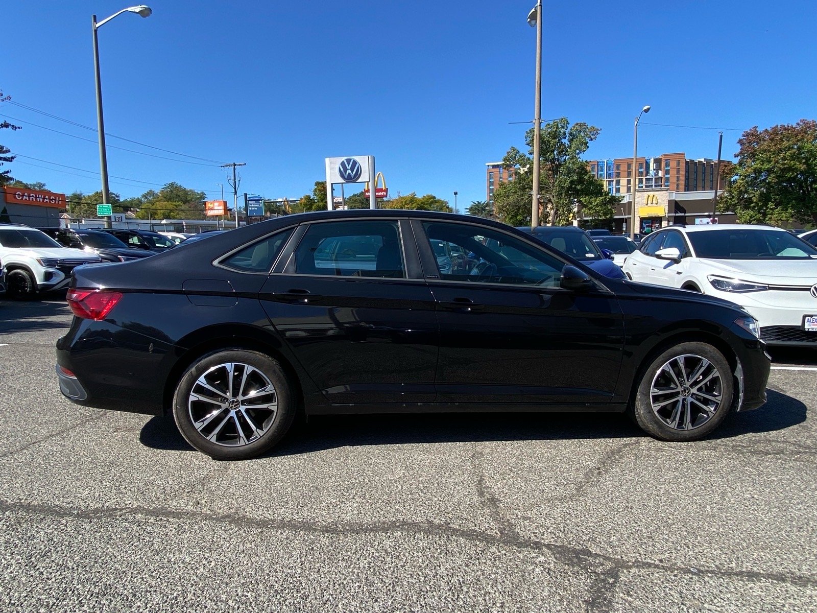 Certified Used 2025 Black Volkswagen 1.5T Sport image 2