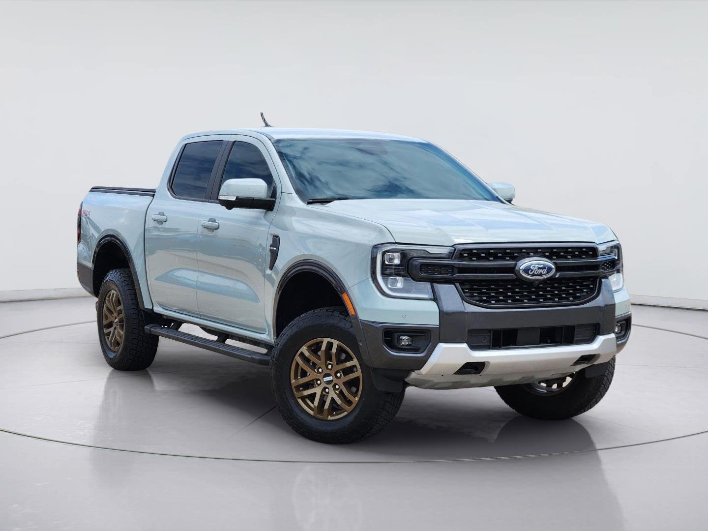 Used 2024 Cactus Gray Ford LARIAT image 1