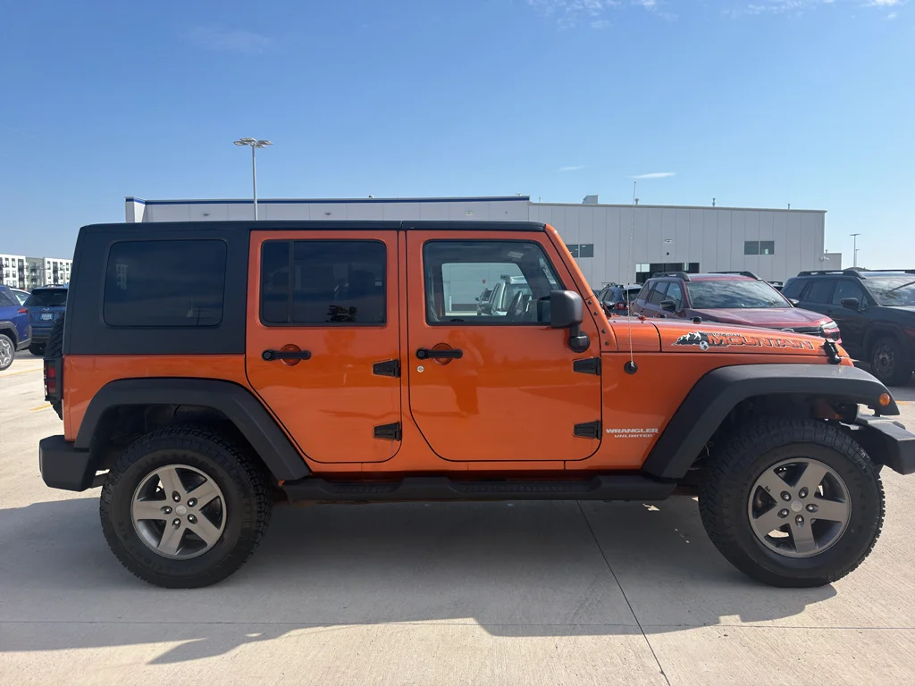Used 2010 ORANGE Jeep Mountain image 4