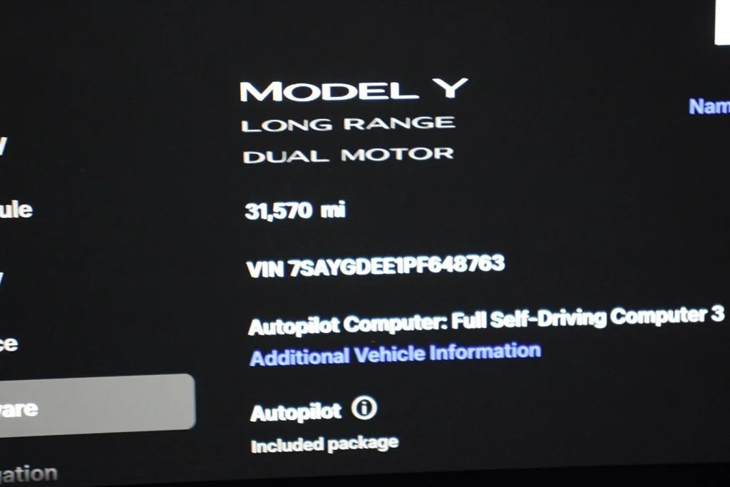 Used 2023 Solid Black Tesla Long Range image 21